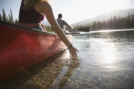 Canoers paddling along